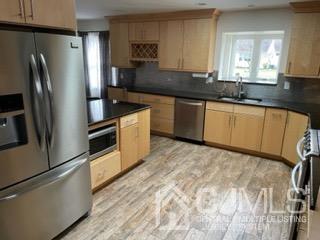 20 Ramsey Road Middlesex, NJ 08846 - Photo 7 of 33 a kitchen with granite countertop a refrigerator sink and stove