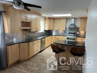 20 Ramsey Road Middlesex, NJ 08846 - Photo 8 of 33 a kitchen with a sink cabinets and window