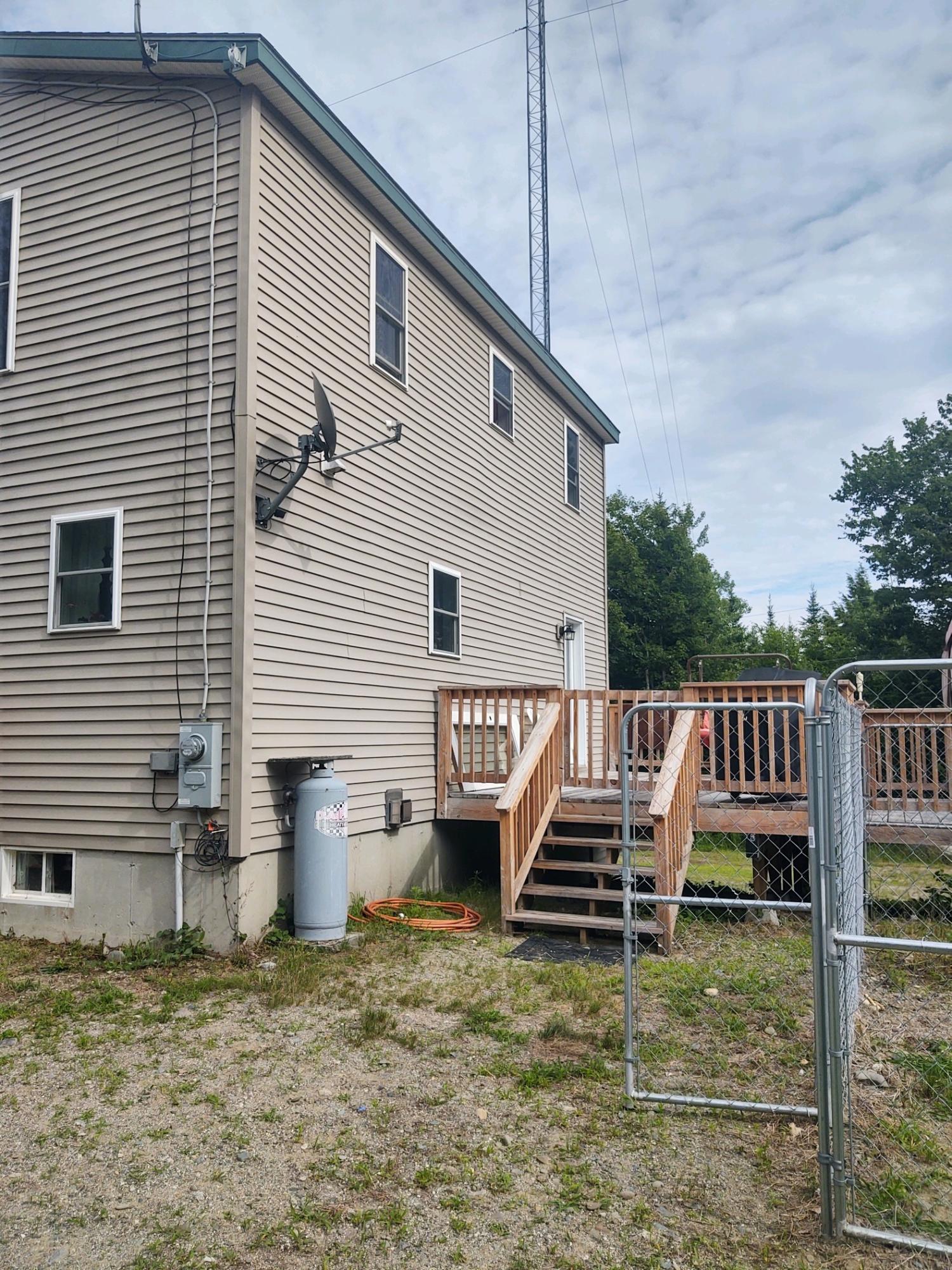 3 Fm Farm Road Clifton, ME 04428 - Photo 6 of 41 rear deck entrance 1