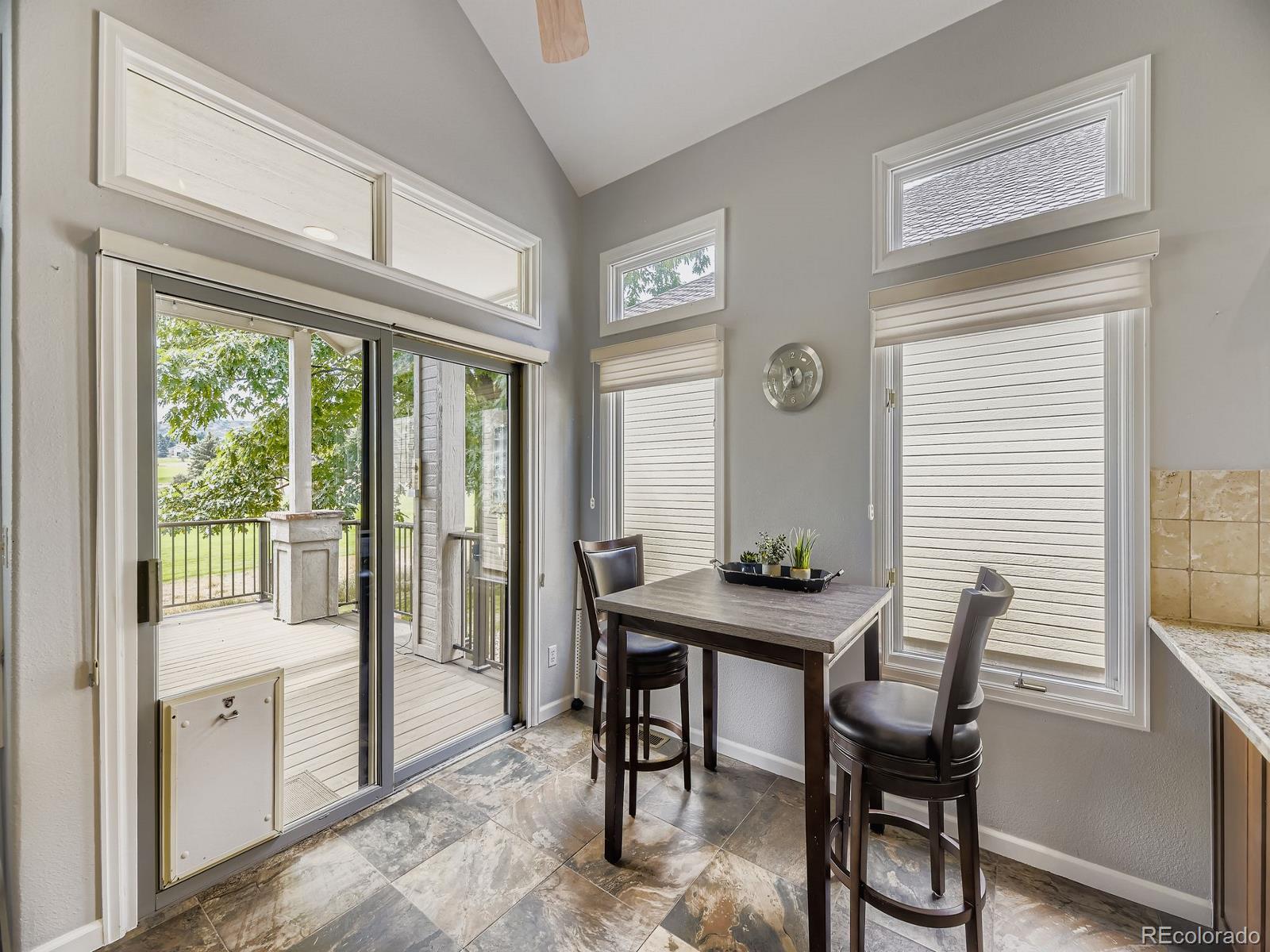 15906 Double Eagle Drive Morrison, CO 80465 - Photo 11 of 34 a view of a dining room with furniture window and outside view