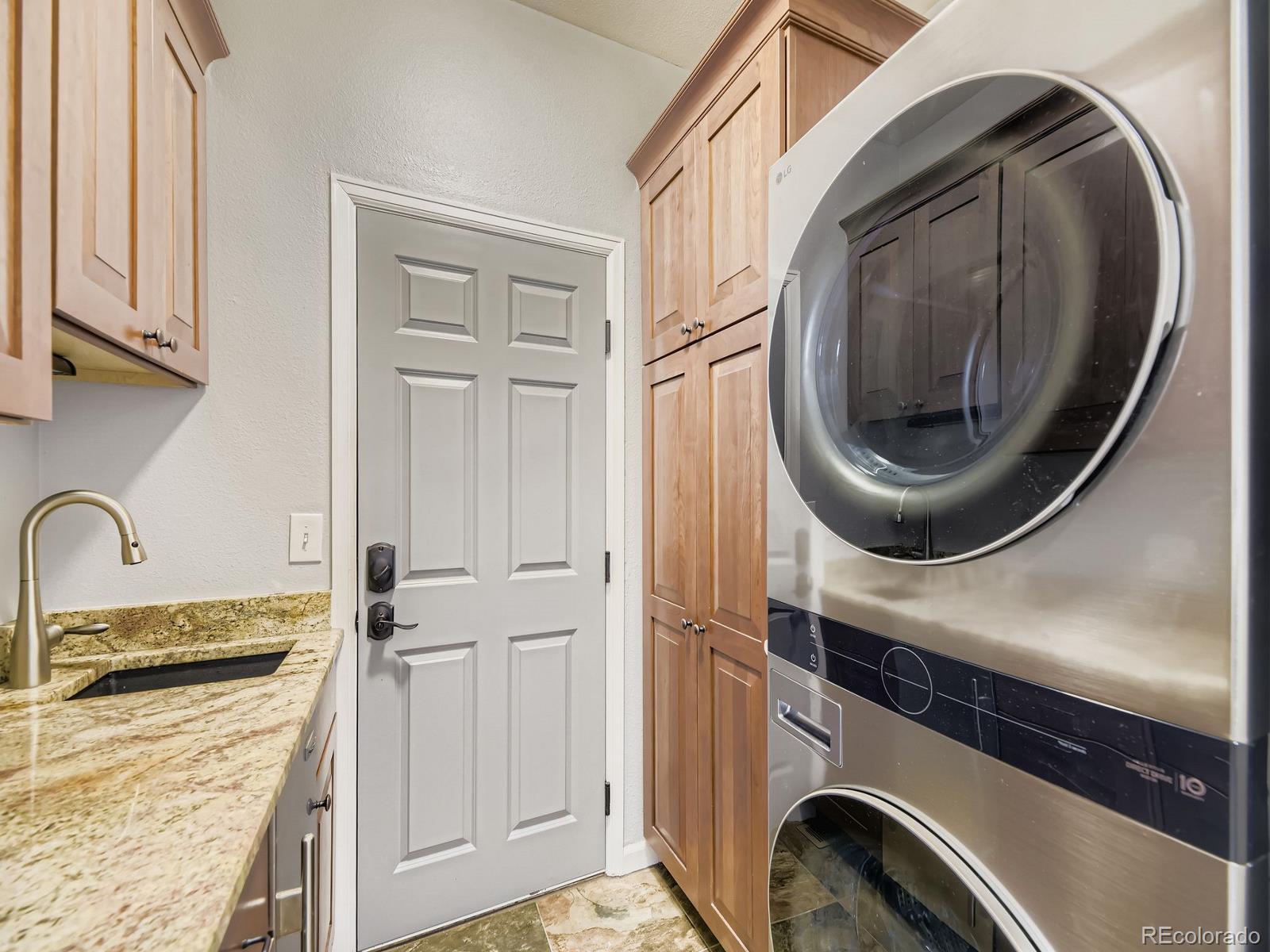 15906 Double Eagle Drive Morrison, CO 80465 - Photo 17 of 34 a kitchen with a sink and a stove