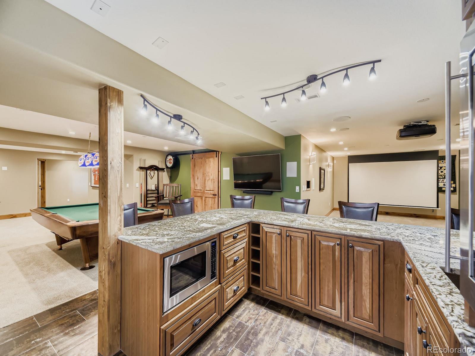 15906 Double Eagle Drive Morrison, CO 80465 - Photo 26 of 34 a kitchen with a stove and a sink