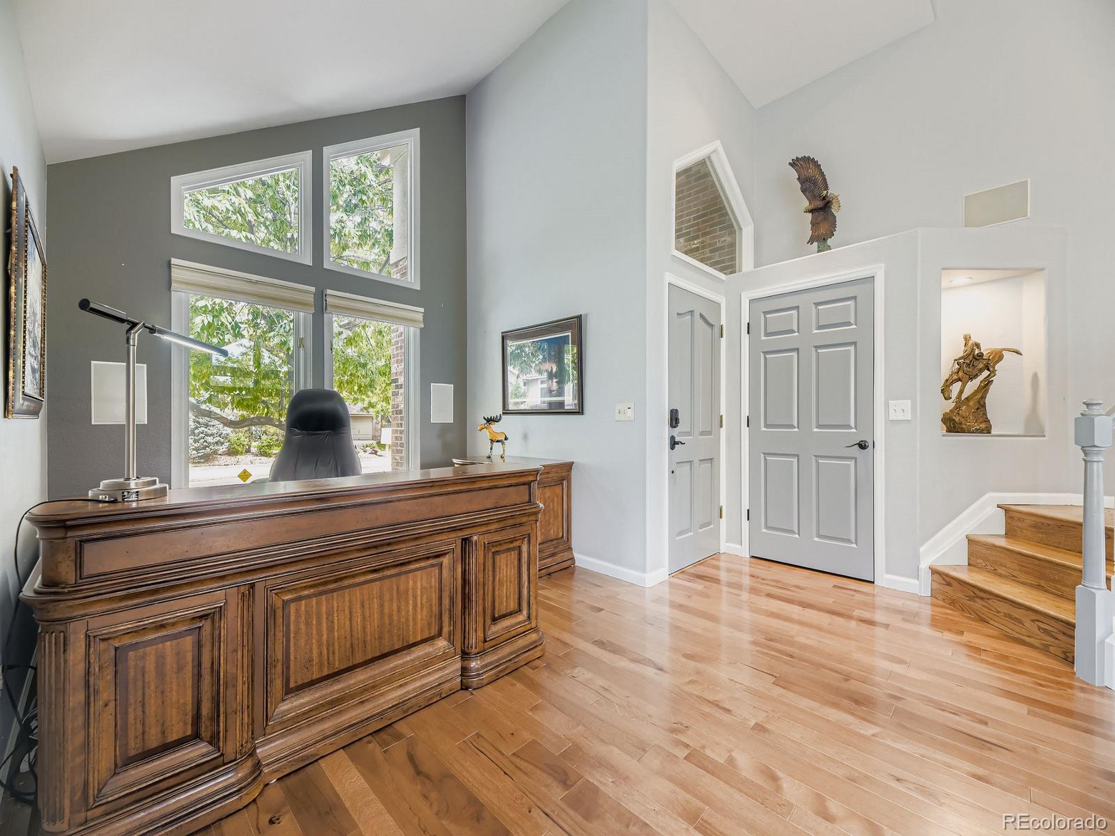 15906 Double Eagle Drive Morrison, CO 80465 - Photo 7 of 34 a living room with wooden floors and a large window