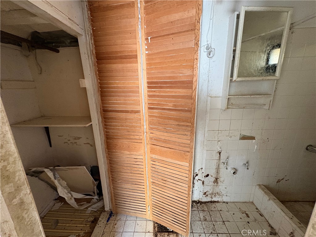 14023 Studebaker Road Norwalk, CA 90650 - Photo 21 of 33 a bathroom with a sink and toilet