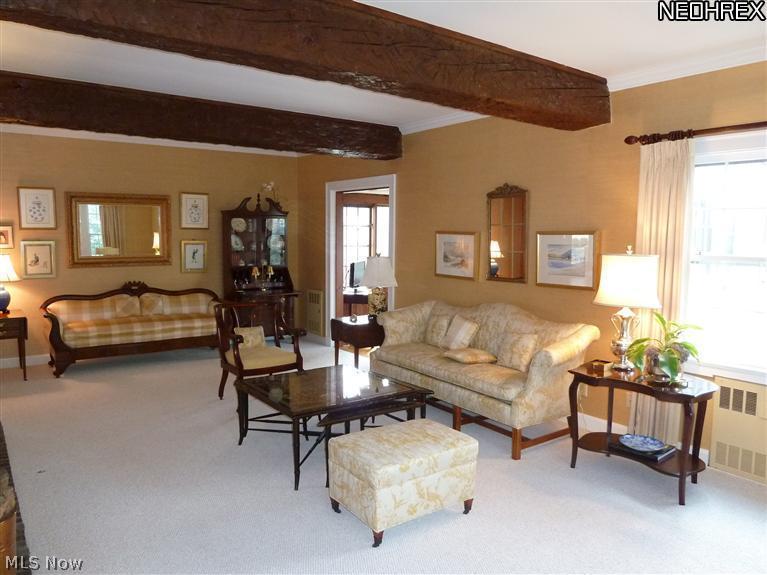 6945 Gates Road Gates Mills, OH 44040 - Photo 3 of 25 Light and bright formal living room with hand hewn beams