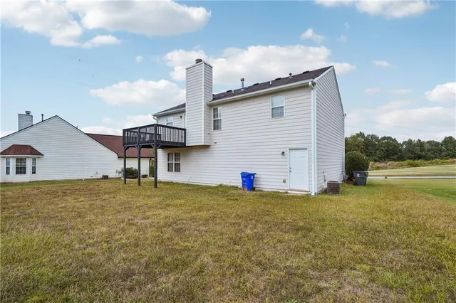 a house view with a garden space