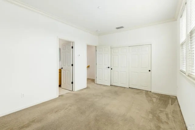 an empty room with an entryway