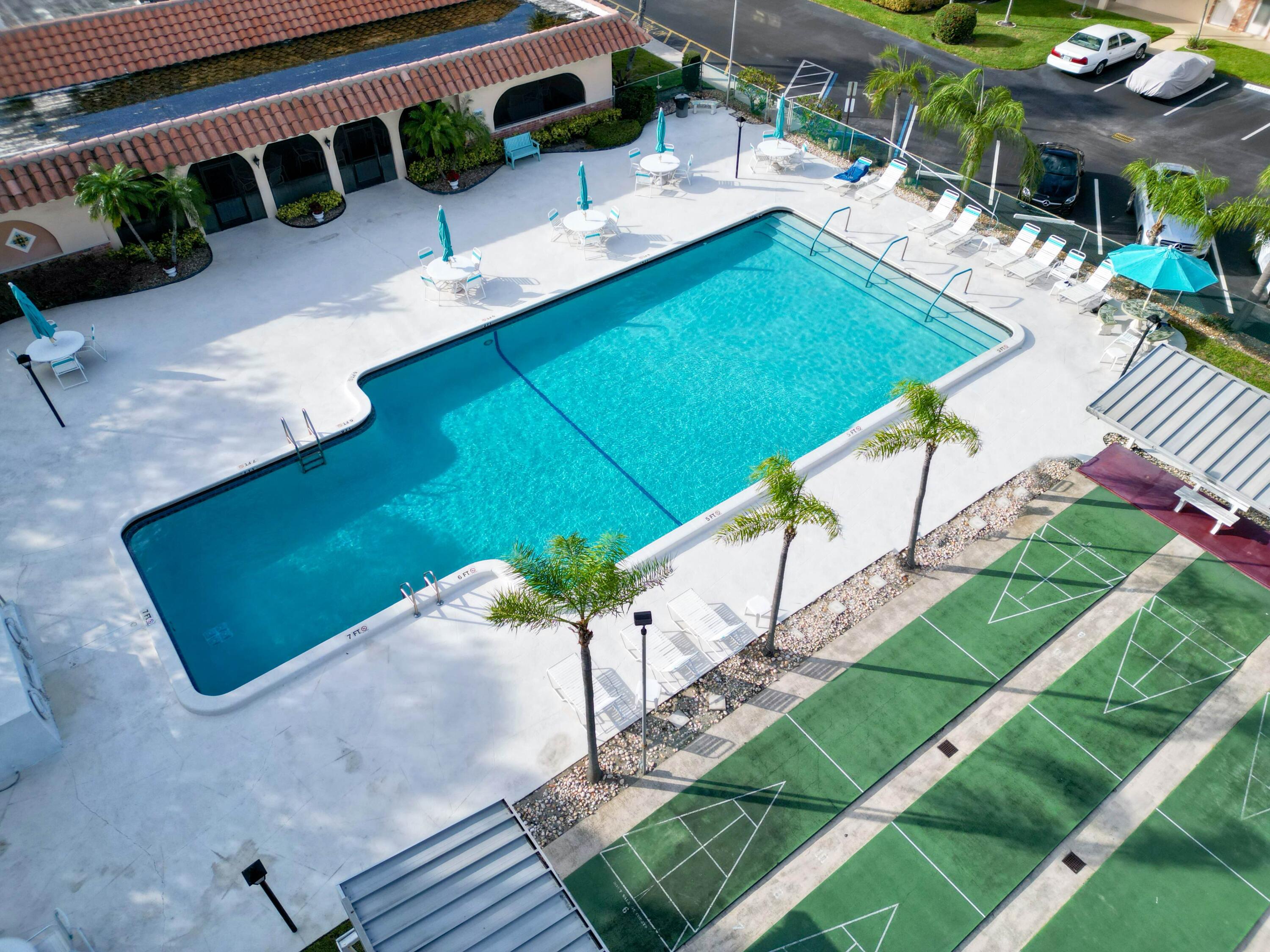 400 Northeast 20th Street, Unit A216 Boca Raton, FL 33431 - Photo 28 of 33 lubhouse Pool Bird Eye