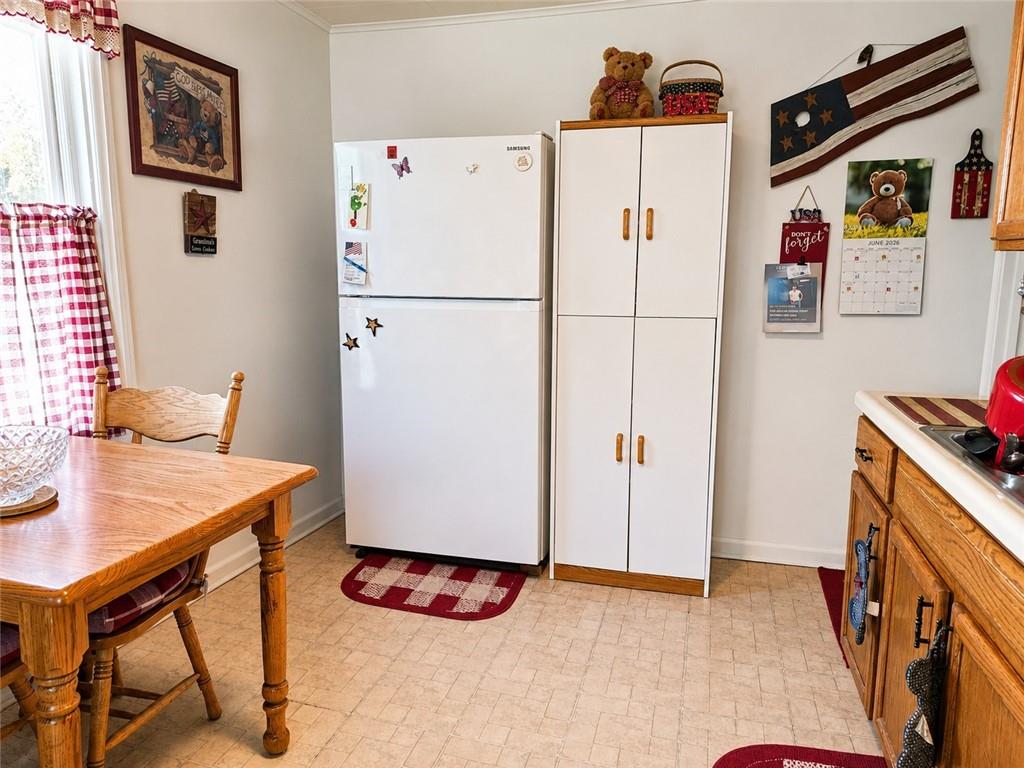 741 Center Avenue Butler, PA 16001 - Photo 4 of 27 a kitchen with stainless steel appliances a refrigerator sink and a stove