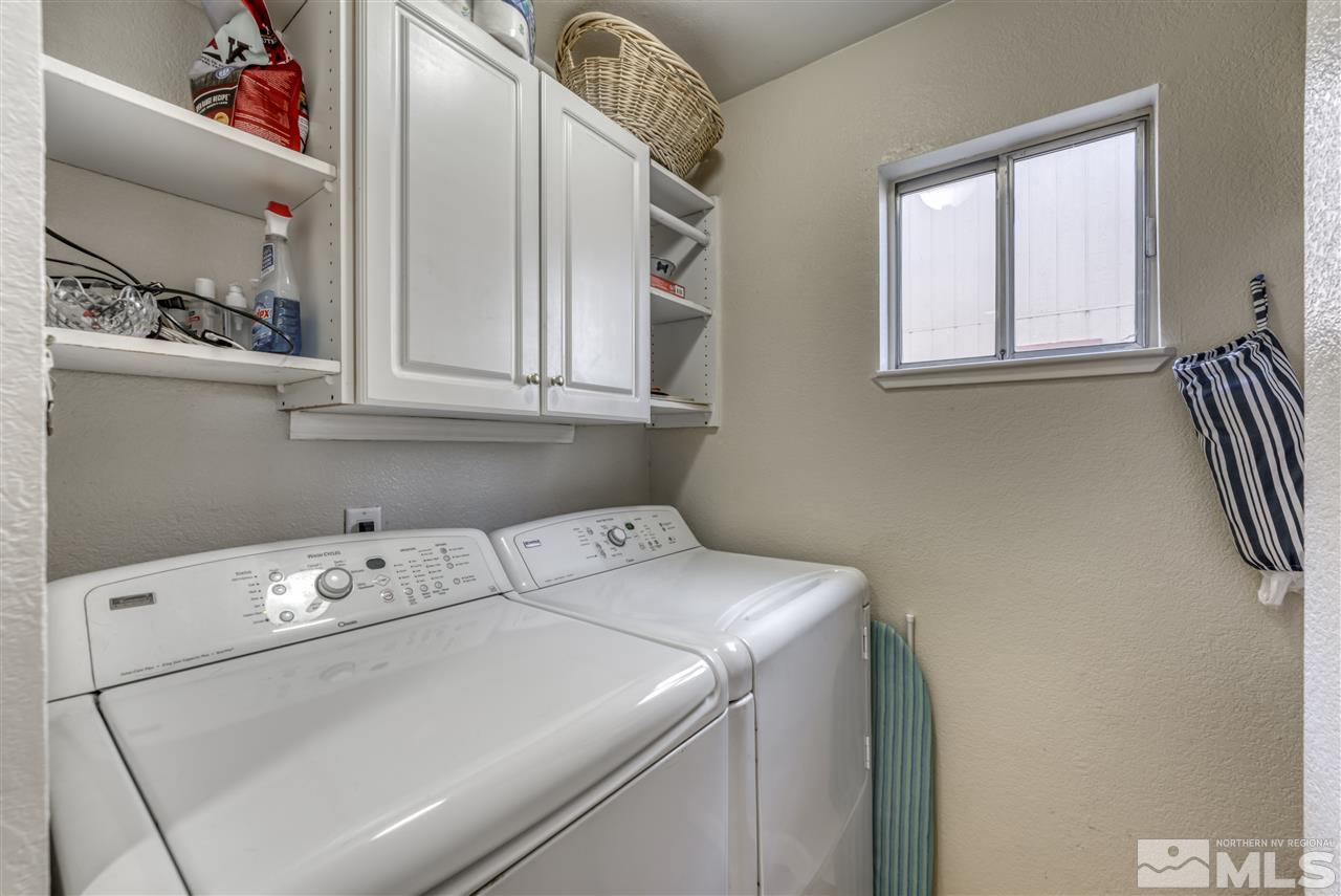 2741 Pajaro Place Reno, NV 89502 - Photo 31 of 36 a utility room with dryer and washer