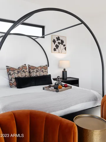 a bathroom with a shower sink and mirror