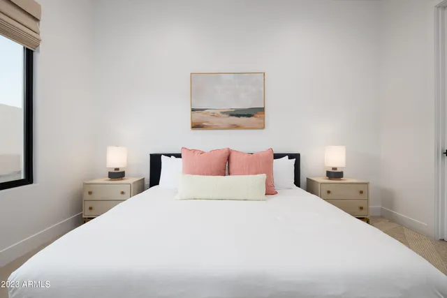 a bathroom with a mirror a sink and vanity