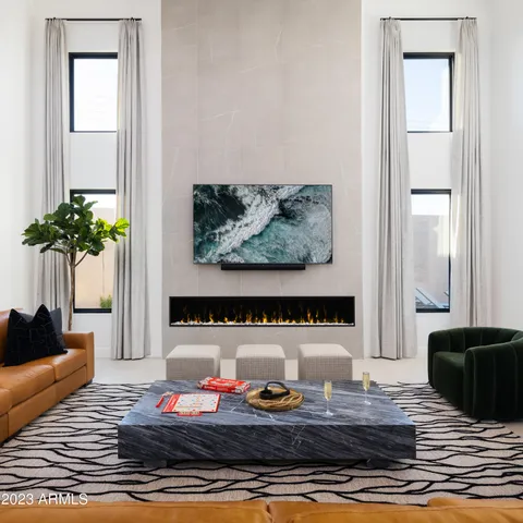 a living room with furniture and a window