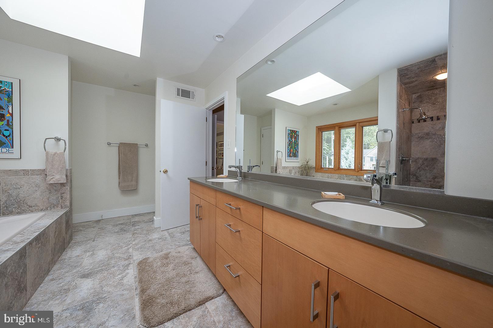 820 Weadley Road Radnor, PA 19087 - Photo 25 of 39 Primary Bathroom with a two sink vanity