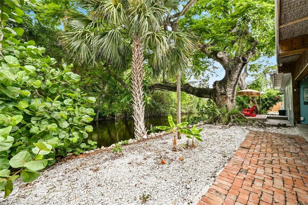 3113 Basin Street Naples, FL 34112 - Photo 47 of 49 a view of a park with potted plants