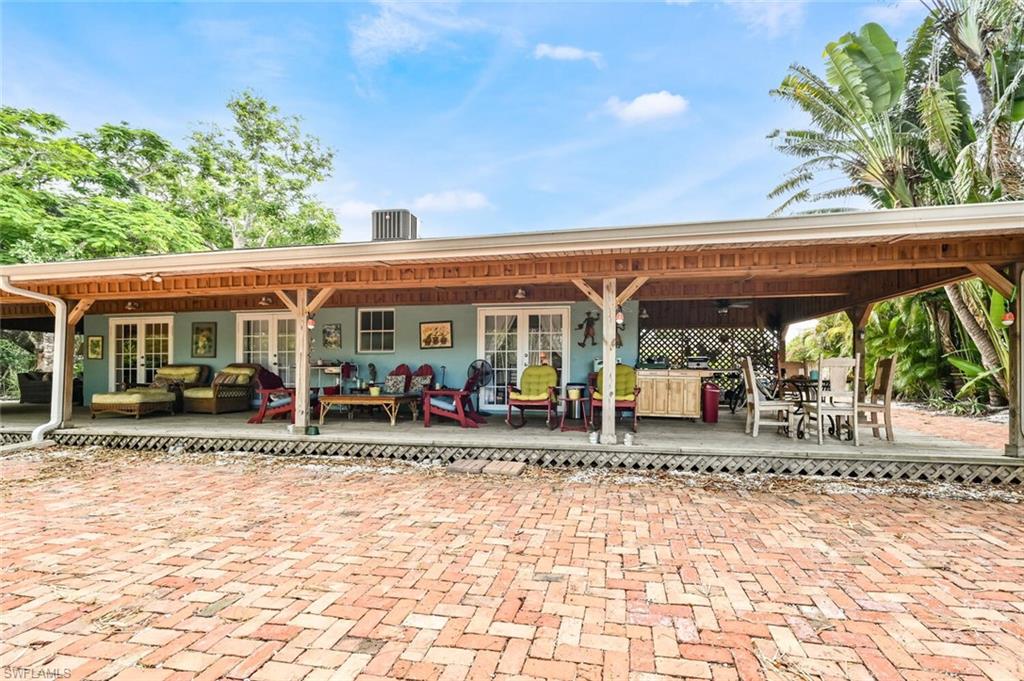 3113 Basin Street Naples, FL 34112 - Photo 5 of 49 a view of a house with a patio