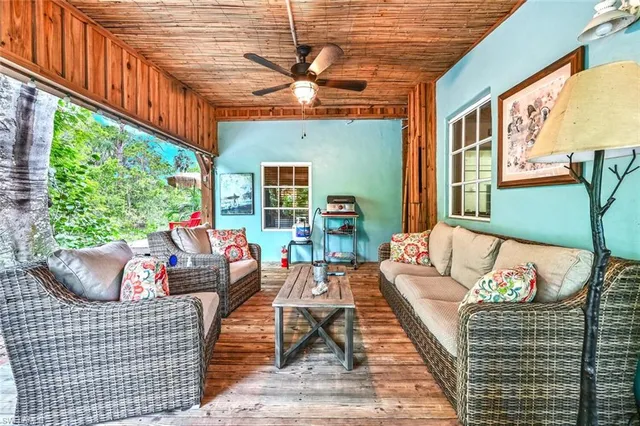 a outdoor living space with patio furniture and a potted plant