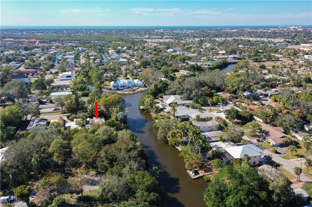 3113 Basin Street Naples, FL 34112 - Photo 9 of 49 an aerial view of a city with lots of residential buildings