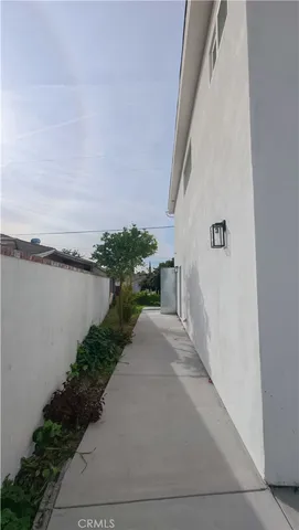 a bathroom with a double vanity sink toilet and shower