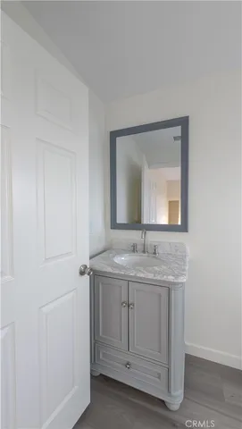a view of a livingroom with wooden floor