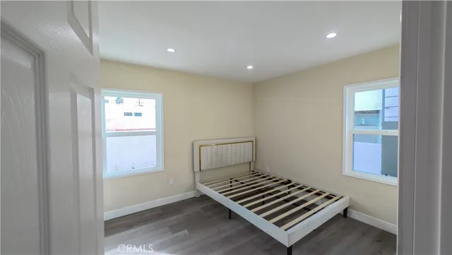 a bathroom with a sink mirror and vanity