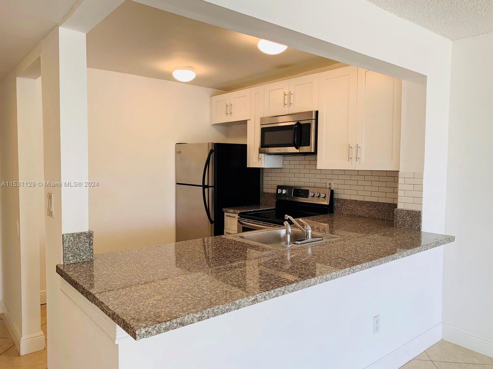 492 Northwest 165th St Unit C309  