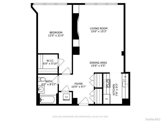 a black and white photo of a bench in front of a wall