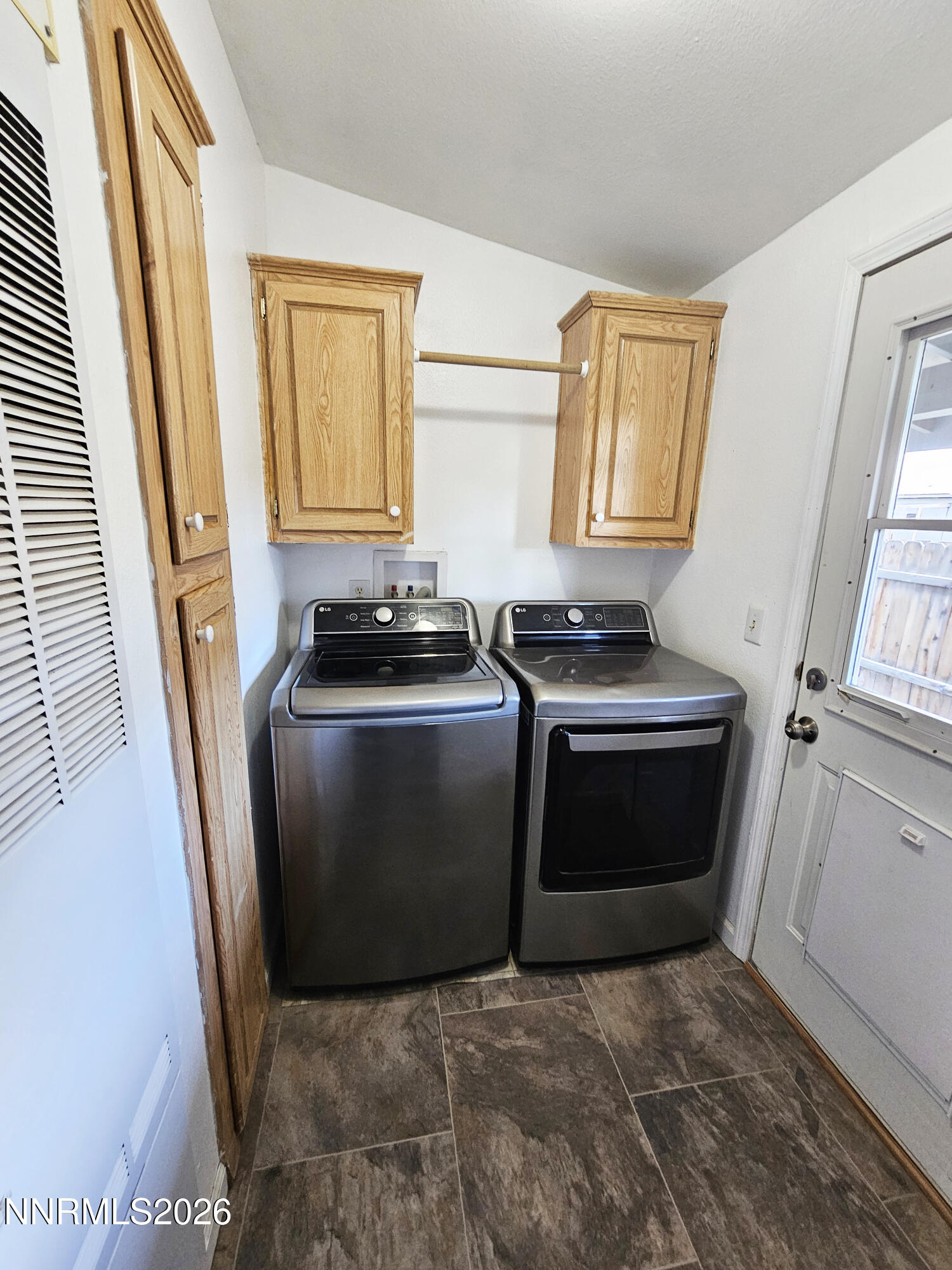 1125 Rancho Road Fernley, NV 89408 - Photo 15 of 47 a kitchen with a stove and a cabinet
