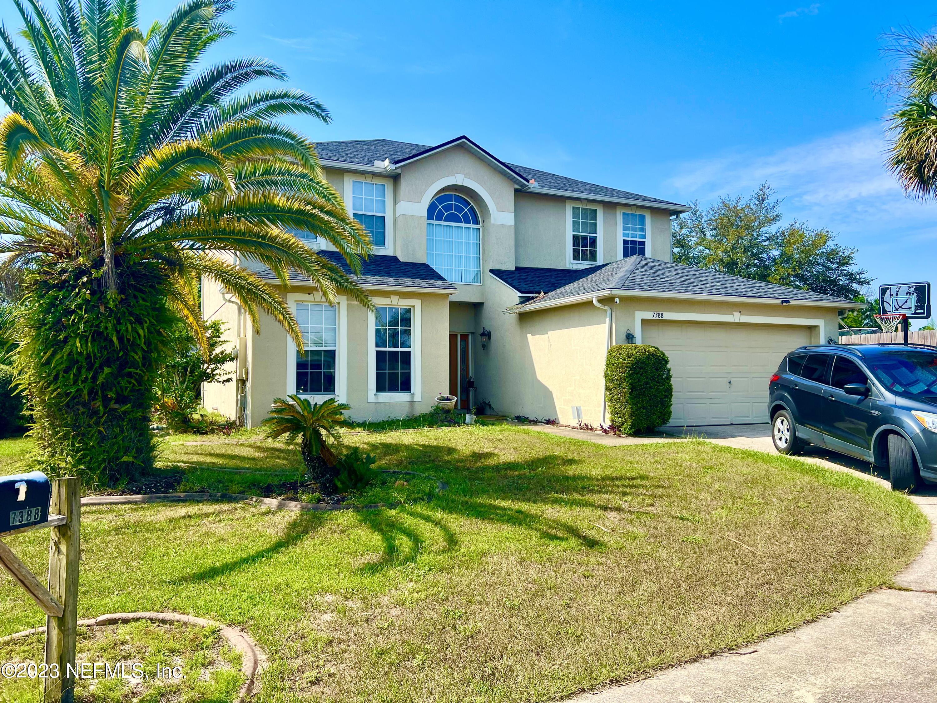 7388 Spring Hill Road Jacksonville, FL 32244 - Photo 2 of 28 a view of house with outdoor space and swimming pool