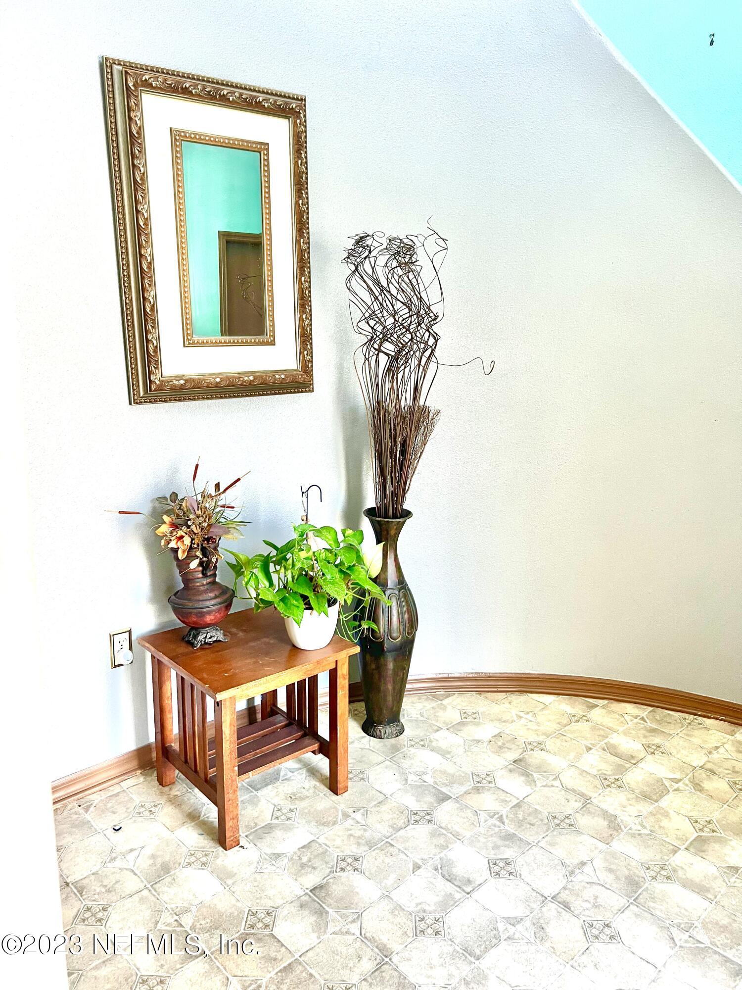 7388 Spring Hill Road Jacksonville, FL 32244 - Photo 4 of 28 a view of a room with a bench