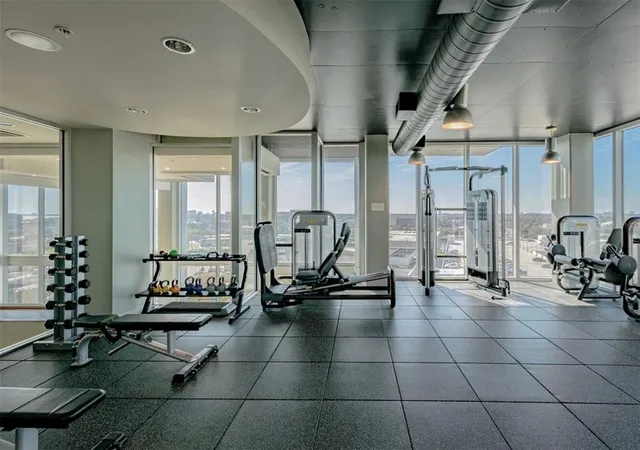 a kitchen with a refrigerator and a sink