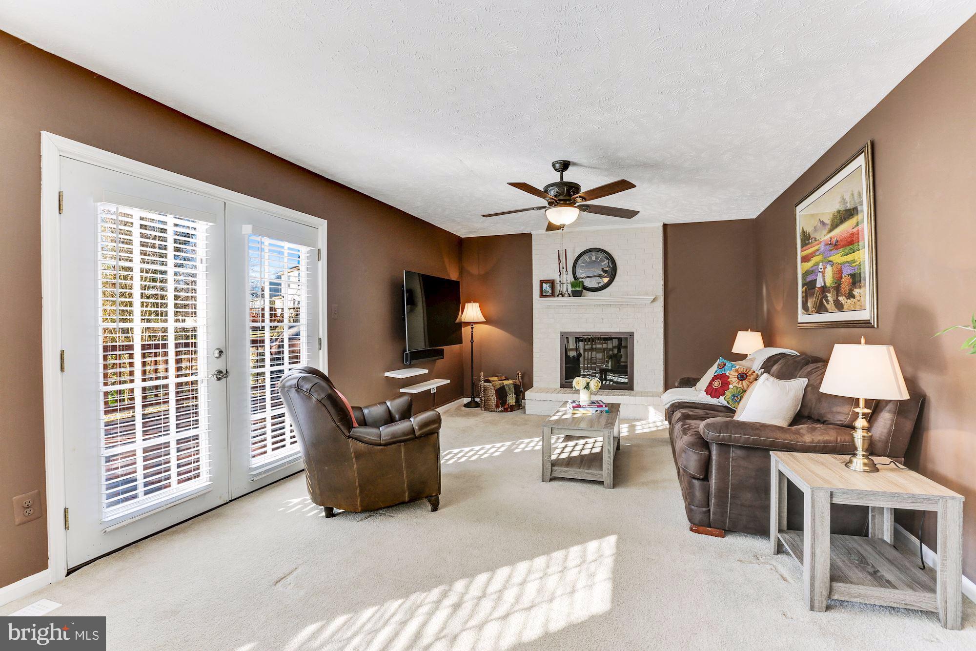 2304 Cavesson Court Reston, VA 20191 - Photo 13 of 45 Cozy family room with fireplace