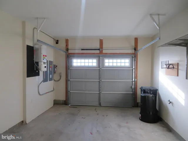 a room with cabinets and a window