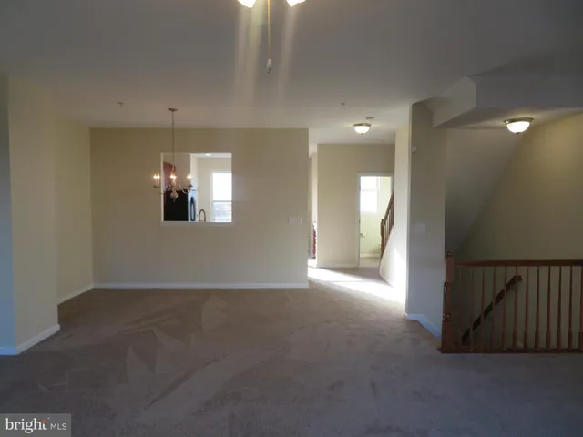 a view of a balcony with wooden floor