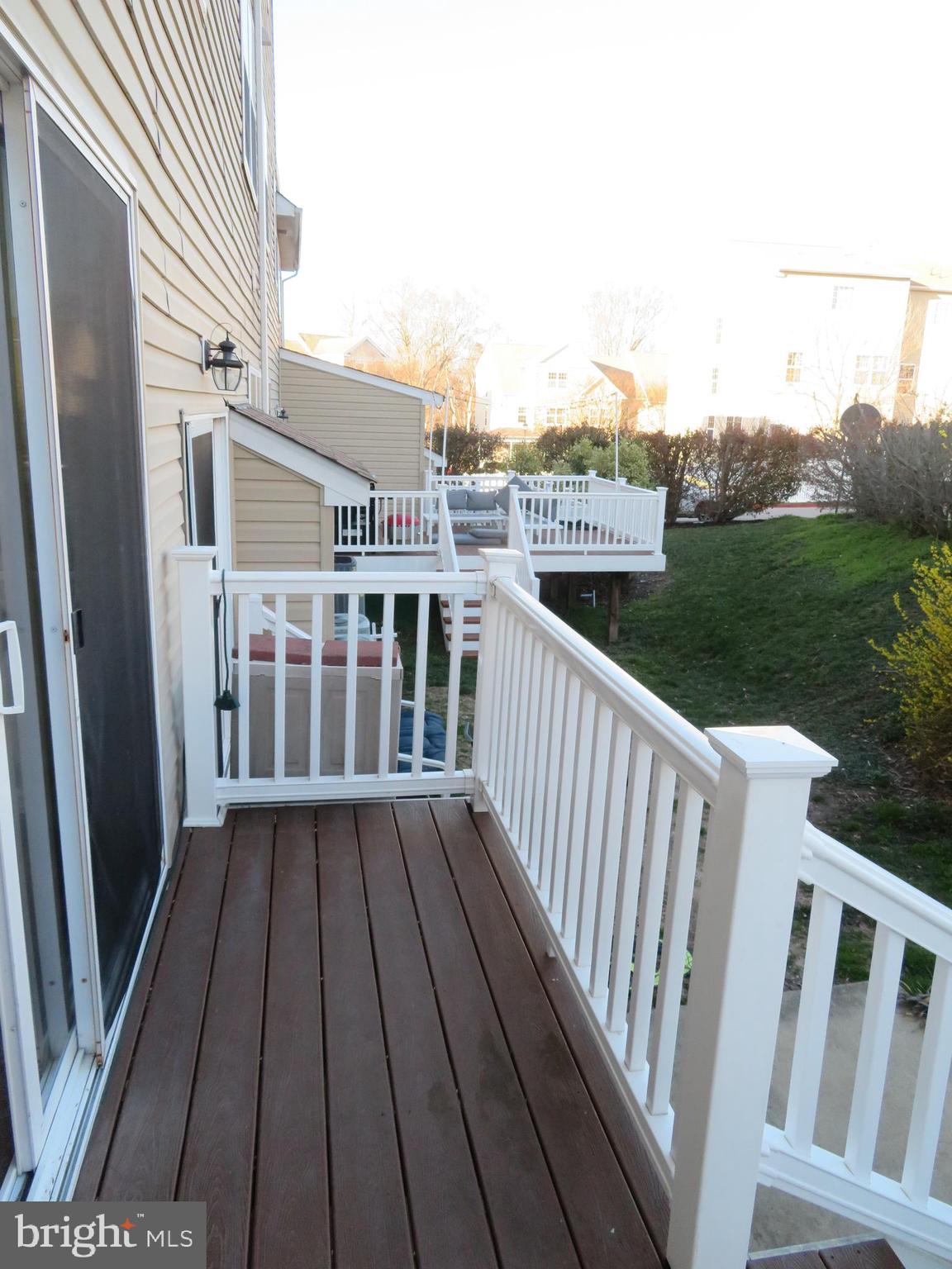 3700 Bedford Drive North Beach, MD 20714 - Photo 17 of 53 a view of a balcony with wooden floor
