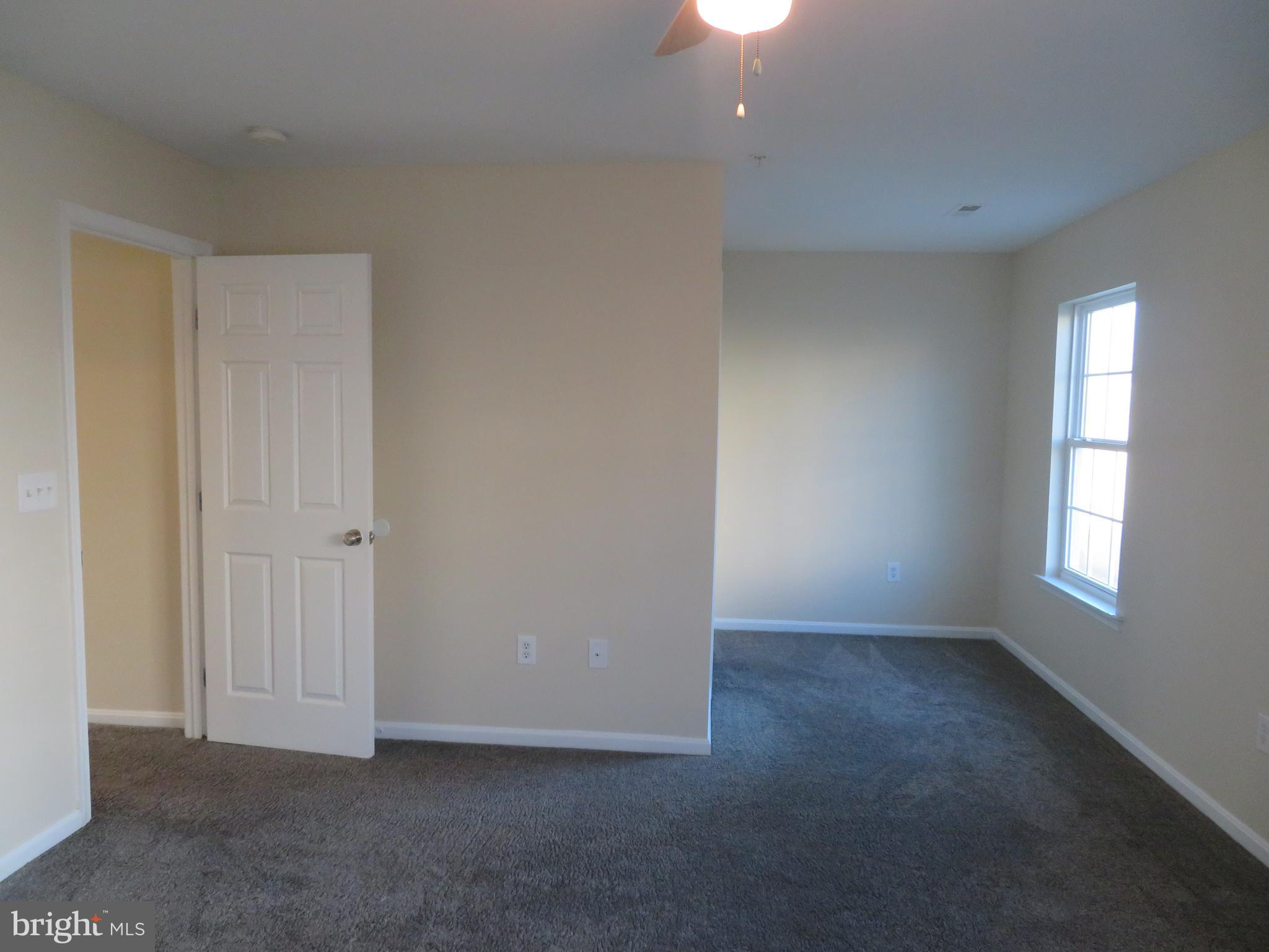 3700 Bedford Drive North Beach, MD 20714 - Photo 29 of 53 a view of an empty room with a window
