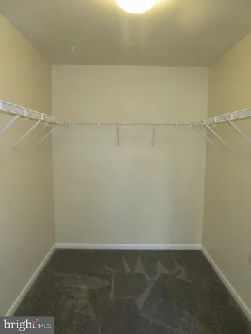 a bathroom with a toilet a sink and bathtub