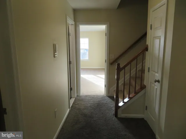 a bathroom with a sink toilet and mirror