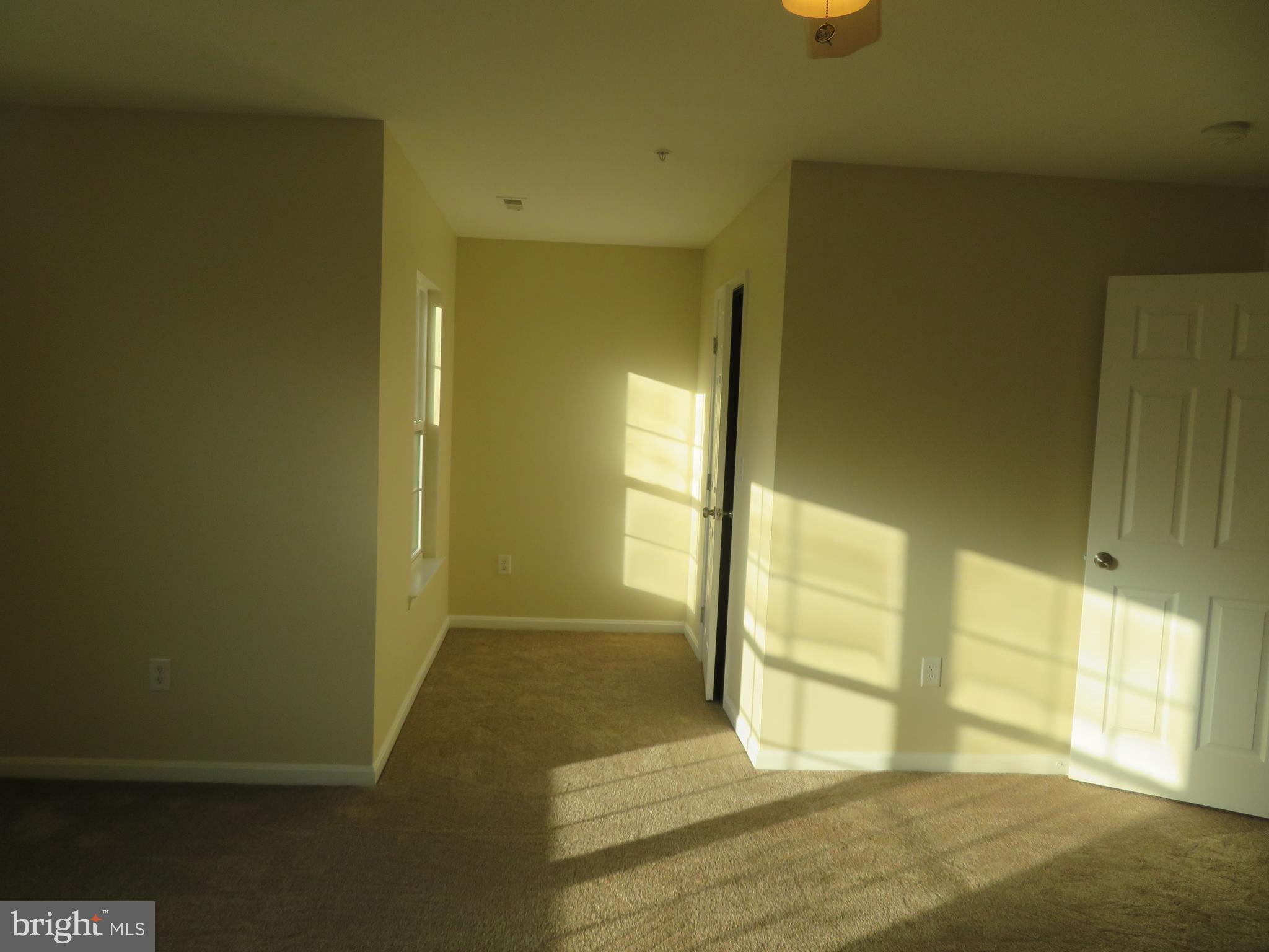 3700 Bedford Drive North Beach, MD 20714 - Photo 38 of 53 a view of an empty room with a window