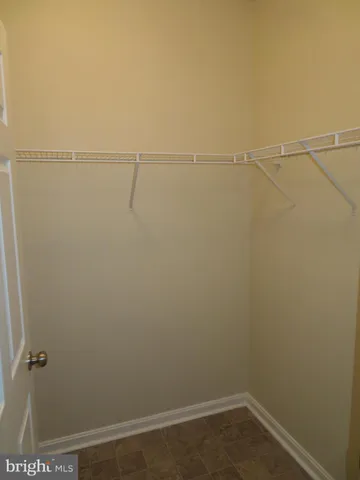 a view of small space with racks on the wall