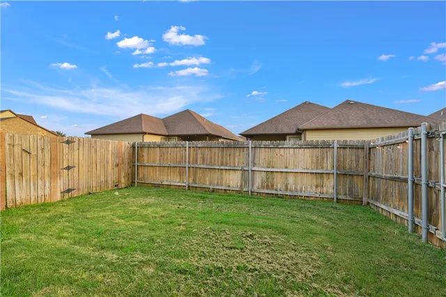 a view of a backyard with a garden