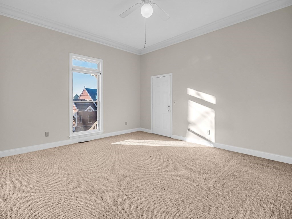 775 Bridge Street Lowell, MA 01850 - Photo 12 of 42 a view of an empty room and window