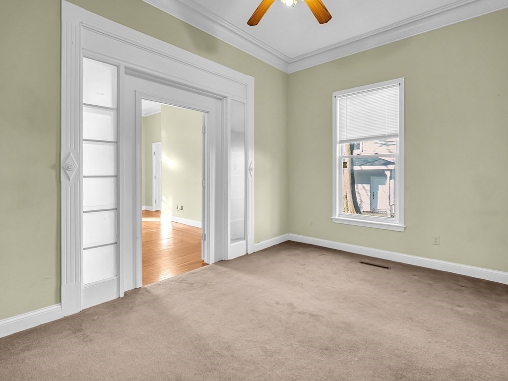 775 Bridge Street Lowell, MA 01850 - Photo 25 of 42 an empty room that has a window