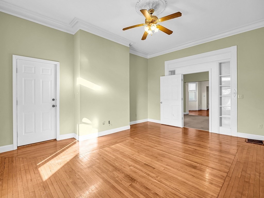 775 Bridge Street Lowell, MA 01850 - Photo 28 of 42 a view of empty room with wooden floor