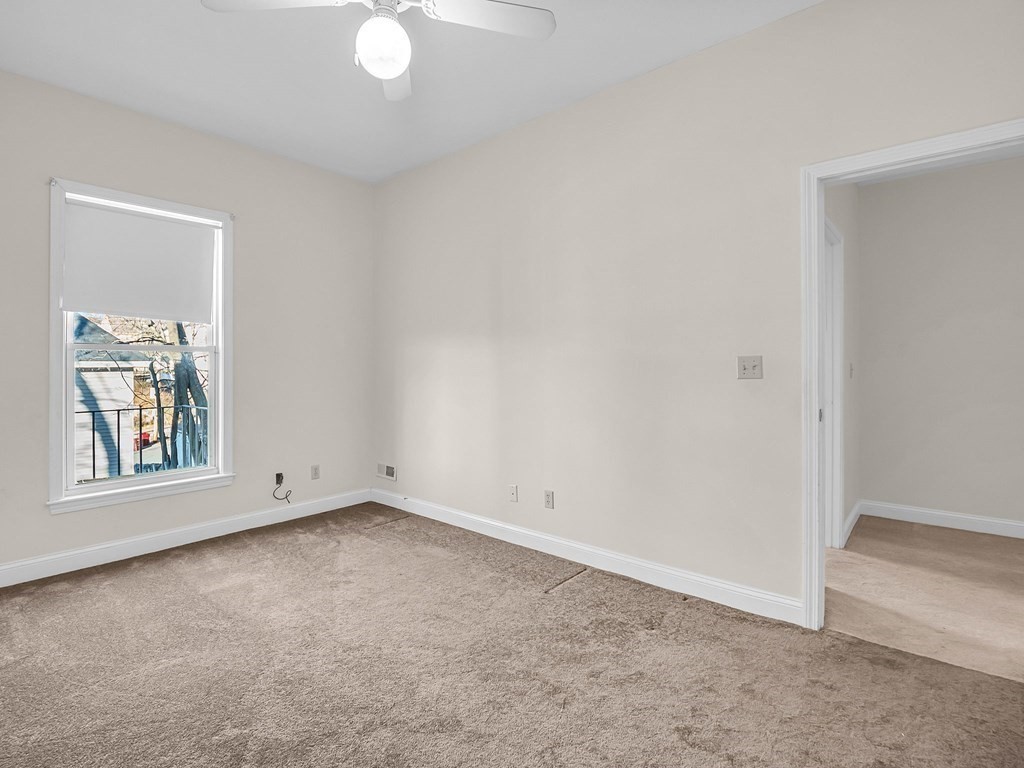 775 Bridge Street Lowell, MA 01850 - Photo 35 of 42 an empty room with windows