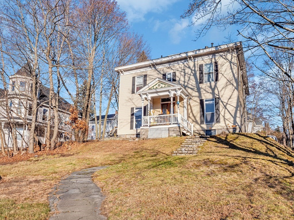 775 Bridge Street Lowell, MA 01850 - Photo 40 of 42 a view of a house with a snow on the wall