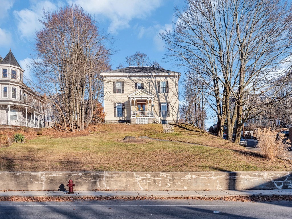775 Bridge Street Lowell, MA 01850 - Photo 41 of 42 a front view of house with yard