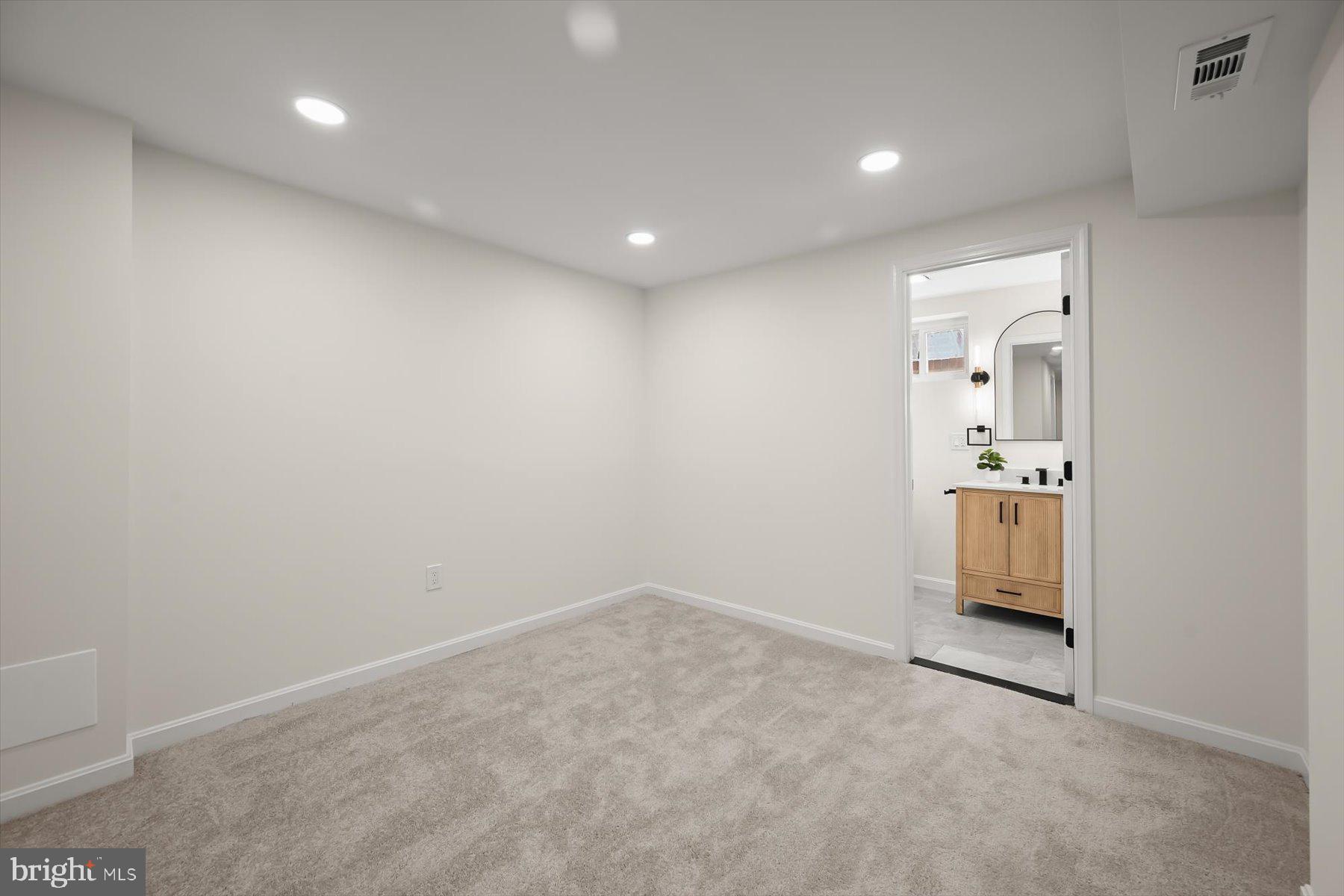 8475 Byrd Road Pasadena, MD 21122 - Photo 23 of 30 Bedroom 4 w/ attached full bath