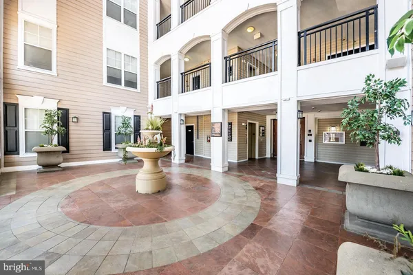 a view of a lobby with a lounge chair