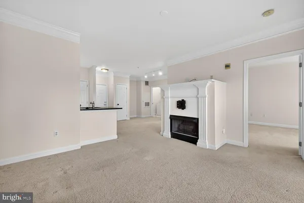 a view of a livingroom with a fireplace